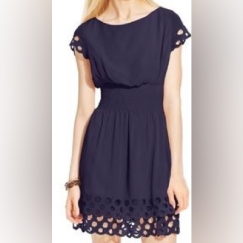 Navy blue Bar III dress. Hem cut outs, cap sleeve, cinched elastic waist.